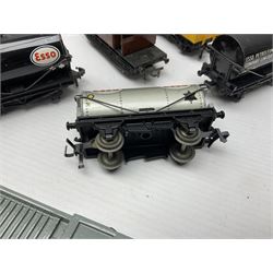 Hornby Dublo - forty-three goods wagons including nine tank wagons (Esso, Mobil, Vacuum, UD and Traffic Services), brake vans, meat and fish wagons, bogie well and bolsters, cable drums, open wagons, salt and grain wagons, etc; and six others by Tri-ang etc; all unboxed (49)