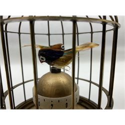 Automation bird cage clock of predominantly brass construction with central rotating orb and two birds with feathered decoration, H19cm
