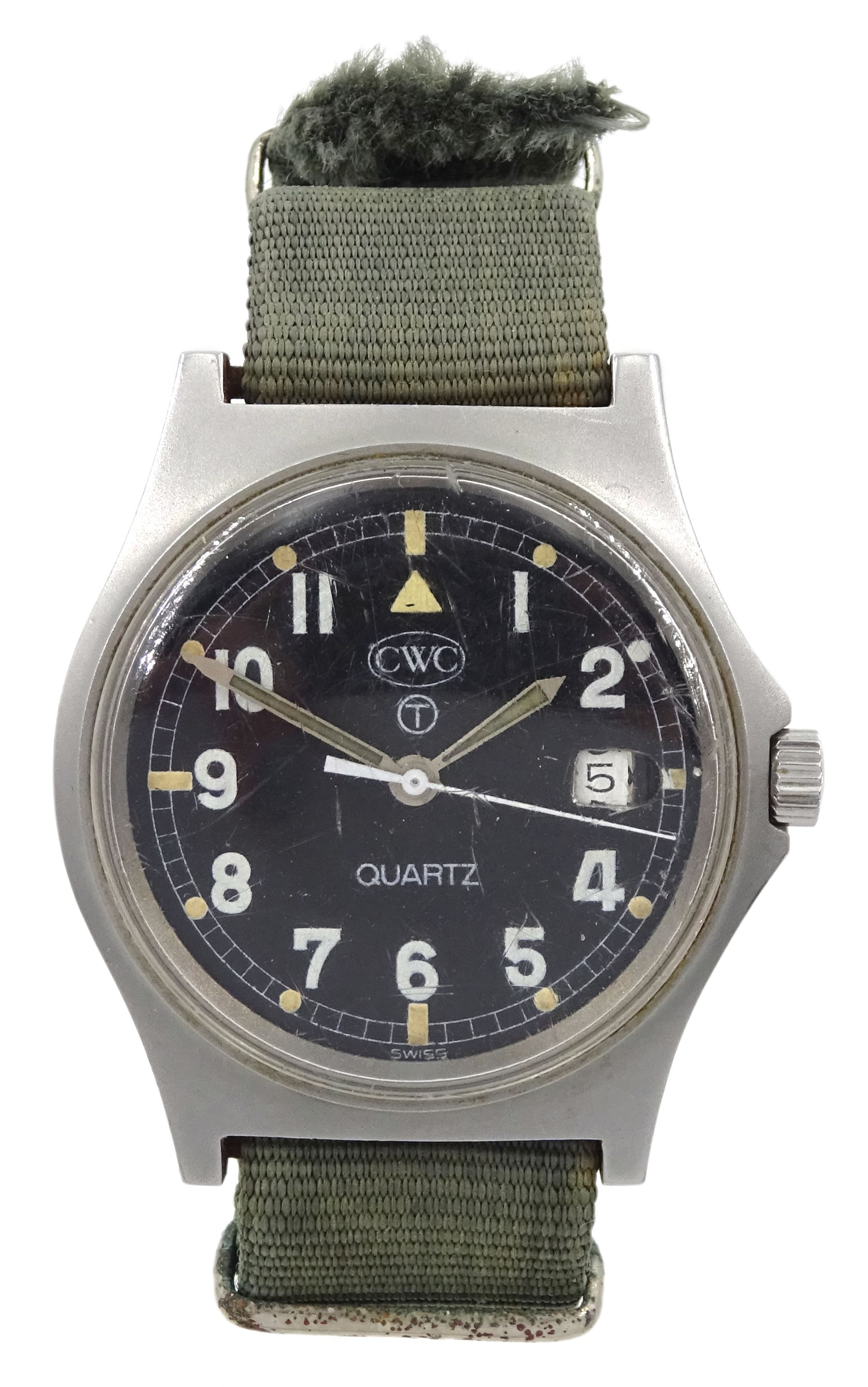 CWC Quartz British Military Army issue stainless steel gentleman's wristwatch, black enamel dial, with broad arrow, circled 'T' for Tritium and date aperture, back case stamped W10/6645-99 5415317 31362 84, on fabric strap