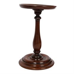 Pair of 19th century turned mahogany candle stands, each with circular top upon a baluster stem and circular stepped base, H25.5cm