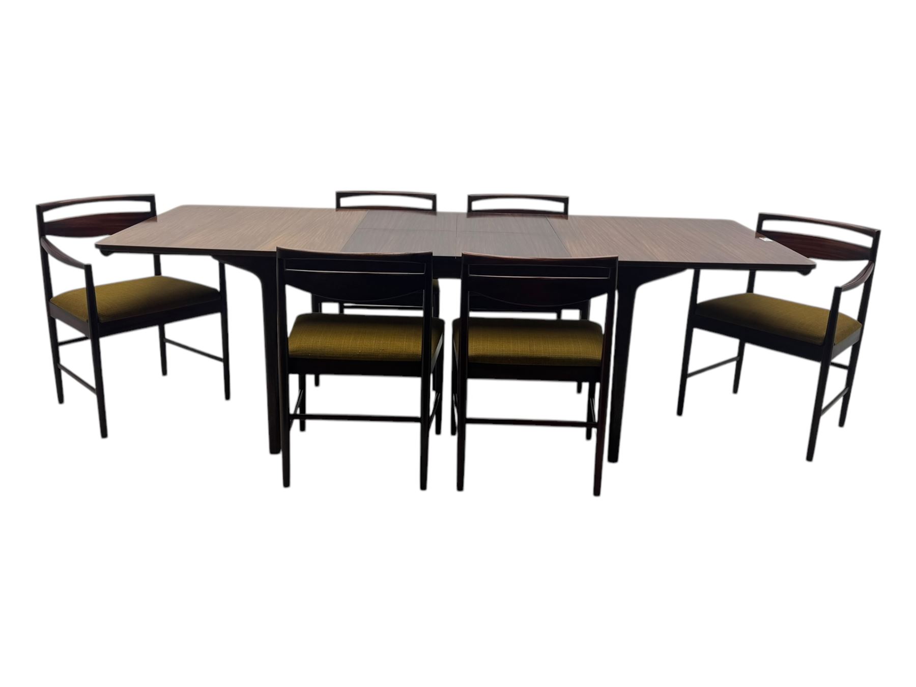 Tom Robertson for McIntosh of Kirkcaldy - mid-20th century 'Dunfermline' dining table, rectangular top with double concealed integral leaf, raised on tapered supports; complete with set of six (4+2) McIntosh dining chairs