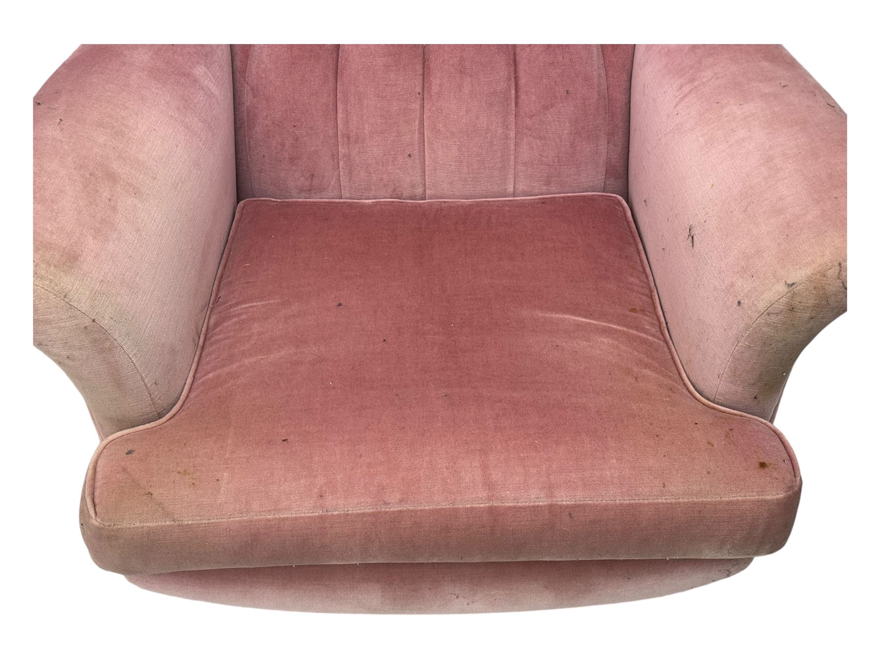 Paul Conti for G-Plan - 'Blofeld' Model 6250 swivel wingback armchair, upholstered in pink velour button back fabric, on teak base with castors