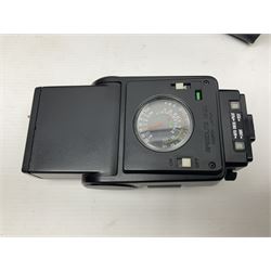 Canon A1 35mm camera body serial no 741264, with 'Tokina AT-X 28-85mm 1:3.5-4.5' lens serial no 821679, 'Canon FD 50mm 1:1.8mm' lens and other camera equipment 