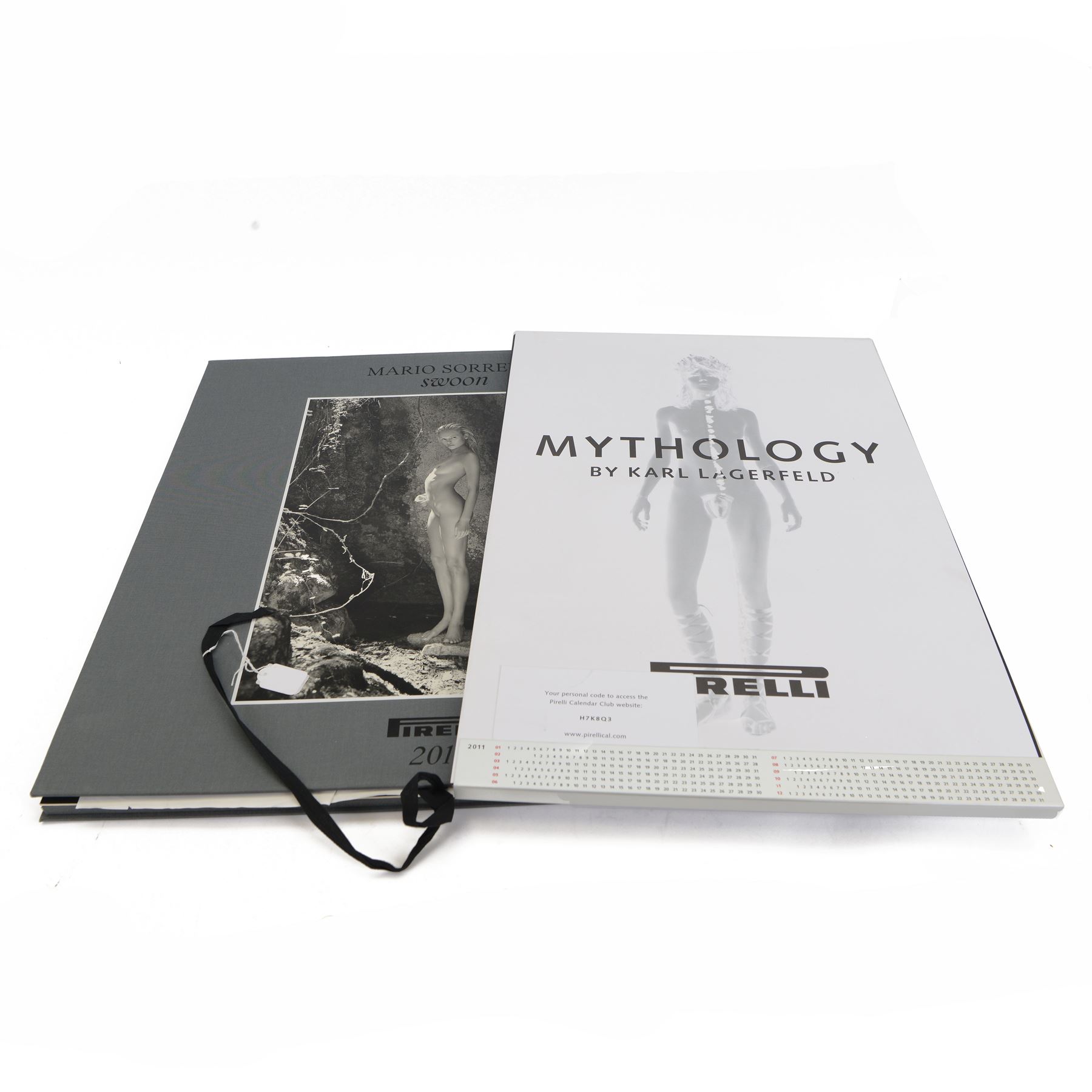 Two Pirelli calendars, 2011 Mythology by Karl Lagerfield and 2012 Swoon by Mario Sorrenti