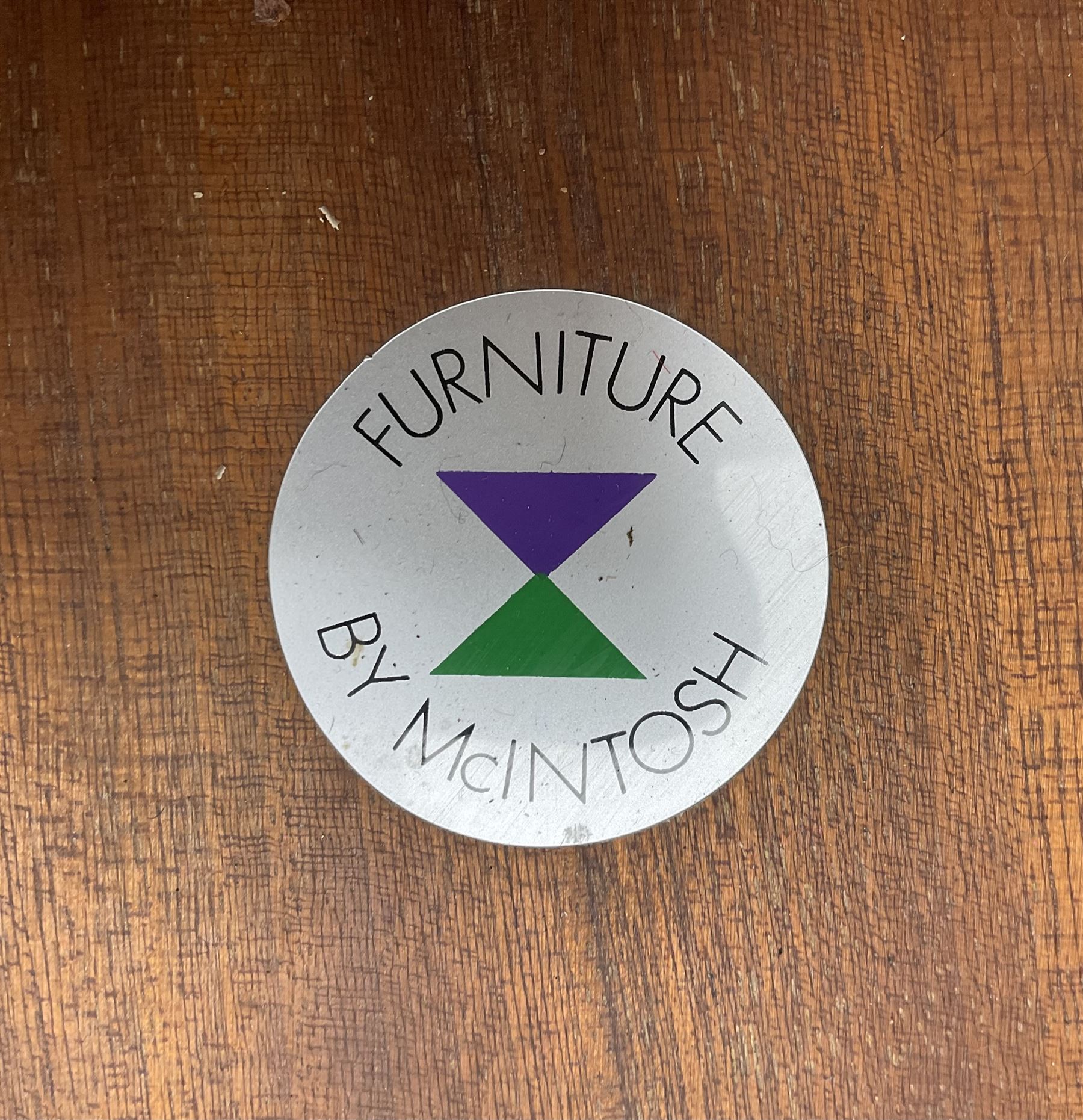 AH McIntosh & Co of Kirkaldy - mid-20th century teak extending dining table, rectangular top with rounded corners, concealed integrated double leaf, raised on tapered supports, 'Furniture by McIntosh sticker to underside of leaf