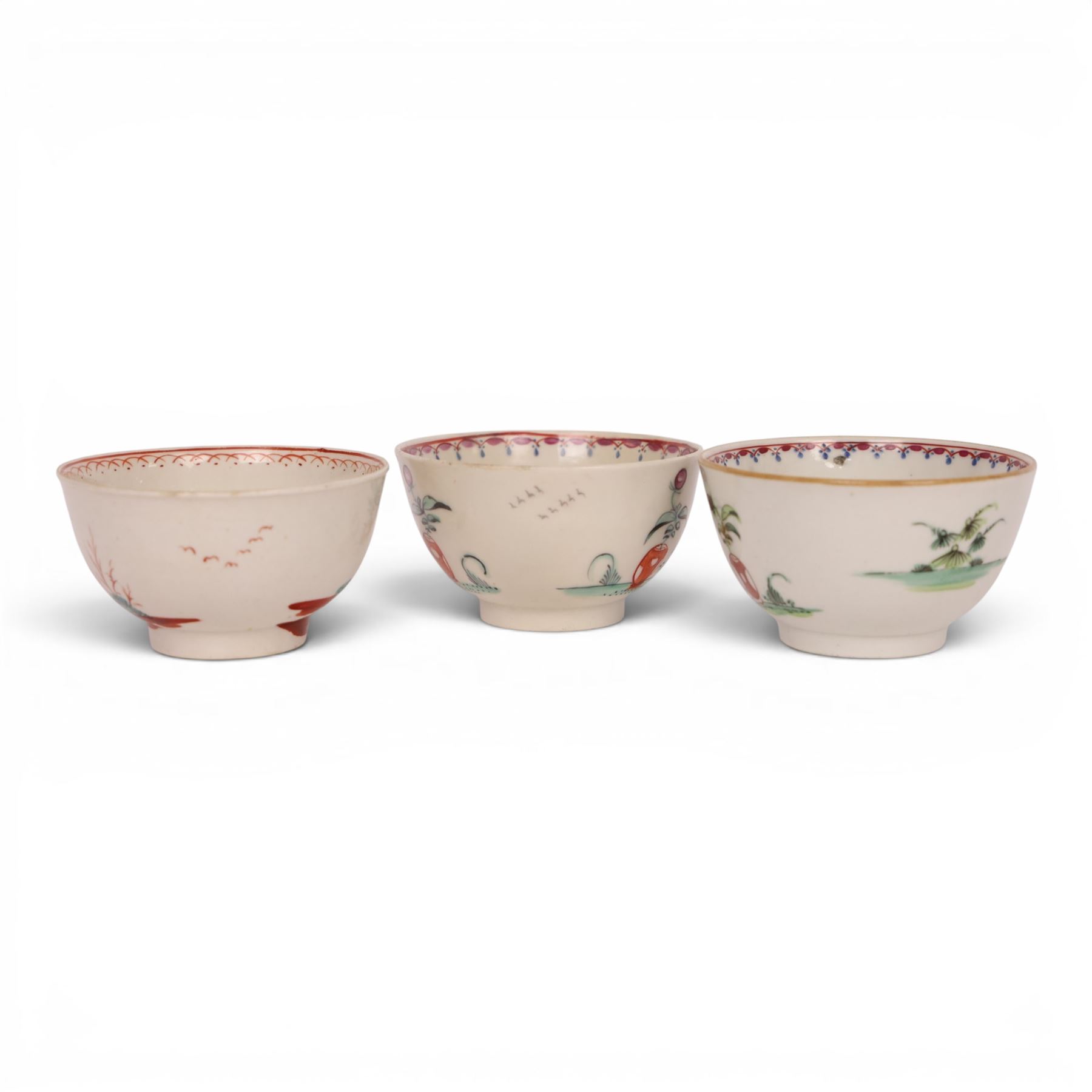 18th/ 19th century chinoiserie decorated porcelain including two New Hall tea bowls and a coffee cup in Boy and the Windmill pattern, Worcester Mandarin coffee cup and Liverpool tea bowl 