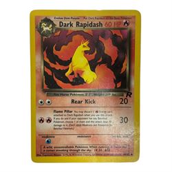 Collection of mainly vintage Pokemon cards including Charizard Base Set Holographic number 4/102 and two Ancient Mew 2000 promo cards, some housed within plastic wallets and some loose