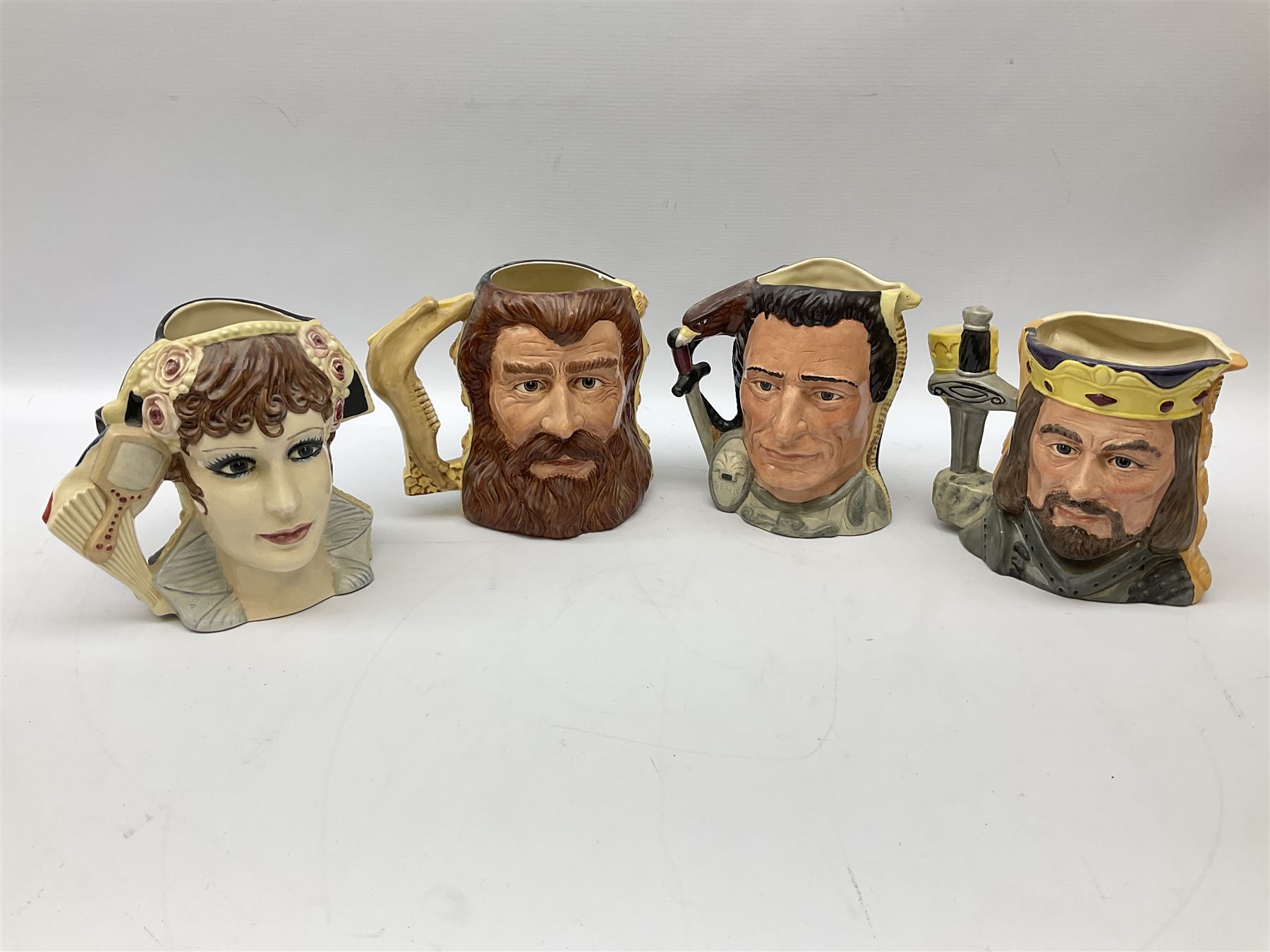 Royal Doulton double-sided character jugs from the Star Crossed Lovers Collection, comprising Napoleon & Josephine D6750, King Arthur & Guinevere D6836, Samson & Delilah D6787 and Antony & Cleopatra D6728