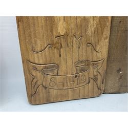 Eight 20th century hardwood Dutch folk art Speculaasplank or biscuit moulds, most examples typically carved with figures in traditional dress, tallest H60cm