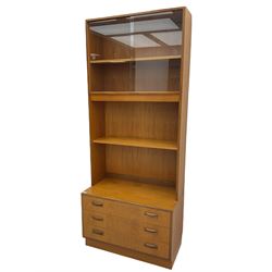 G-Plan teak two sectional modular wall display cabinet, fitted with sliding glass doors, double cupboard and three drawers