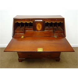  Early 19th century mahogany bureau, fall front enclosing inlaid interior fitted with drawers, cupboards and compartments, above two short and three long graduating moulded drawers, shaped bracket feet, W107cm, H109cm, D56cm  