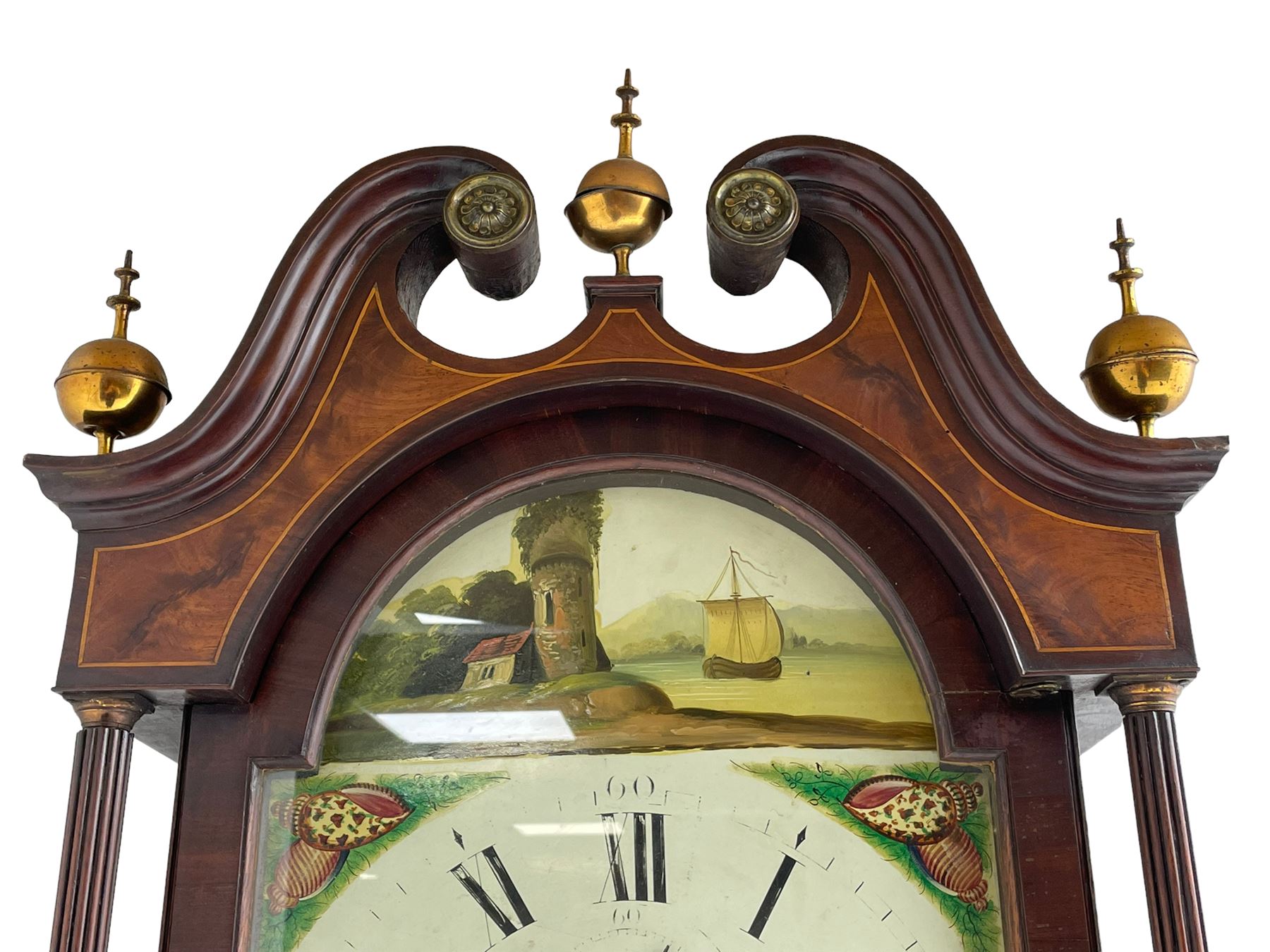 Samuel Ritchie of Forfar - William IV 8-day Scottish longcase clock in a mahogany case, with a swans neck pediment, brass paterae and three ball and spire brass finials, case and trunk inlaid with satinwood stringing on a plinth raised on decorative bracket feet, painted break arch dial depicting a costal scene to the break arch and conch seashells to the spandrels, Roman numerals, subsidiary seconds and date dials with matching steel hands, with a rack striking movement striking the hours on a bell. With weights, key, and pendulum.  Samuel Ritchie is recorded as working in Forfar 1800-37.