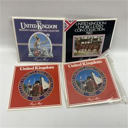 Fourteen Queen Elizabeth II United Kingdom uncirculated coin collections, dated 1983, 1984, two 1985, 1986, 1987, 1988, 1989, 1990, 1991, 1992 including dual dated 1992/1993 EEC fifty pence, 1994 and two 1995, all in card folders