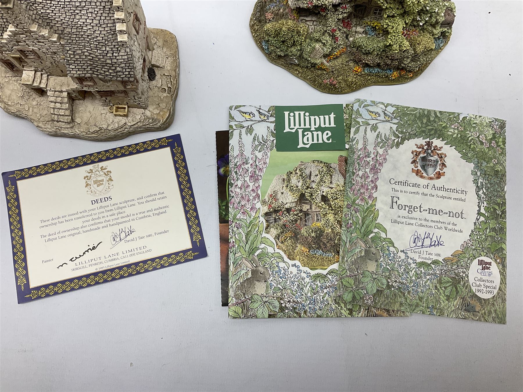 Four limited edition Lilliput Lane cottages, comprising Stockwell Tenement from the Scottish collection, Forget-Me-Not, Cotman Cottage and Stokesay Castle, all boxed with deeds