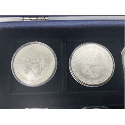Thirty-four United States of America one ounce fine silver coins, dated from 1986 to 2019 being a complete date run, housed in a collectors box