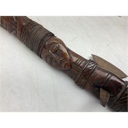 Tribal Art - an African axe, possibly Yoruba, the bone shaft carved as two cord bound stylised figures with iron fan-shaped blade, L35cm overall; and 19th century harpoon or spear head of square section with two long fixing arms on cut-down ash shaft L57cm (2)