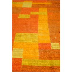 Vintage handwoven modernist rug with cubist design in contrasting tones of amber and orange