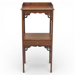 George III mahogany two tier night stand, rectangular tray top with three quarter gallery and shaped cut corners, pierced fret brackets to the apron, fitted with a single drawer to the lower tier, raised on slender square section legs