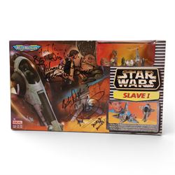 Galoob Micro Machines Star Wars Slave I, signed by Warwick Davis and Michael Sheard in black marker pen to front of box