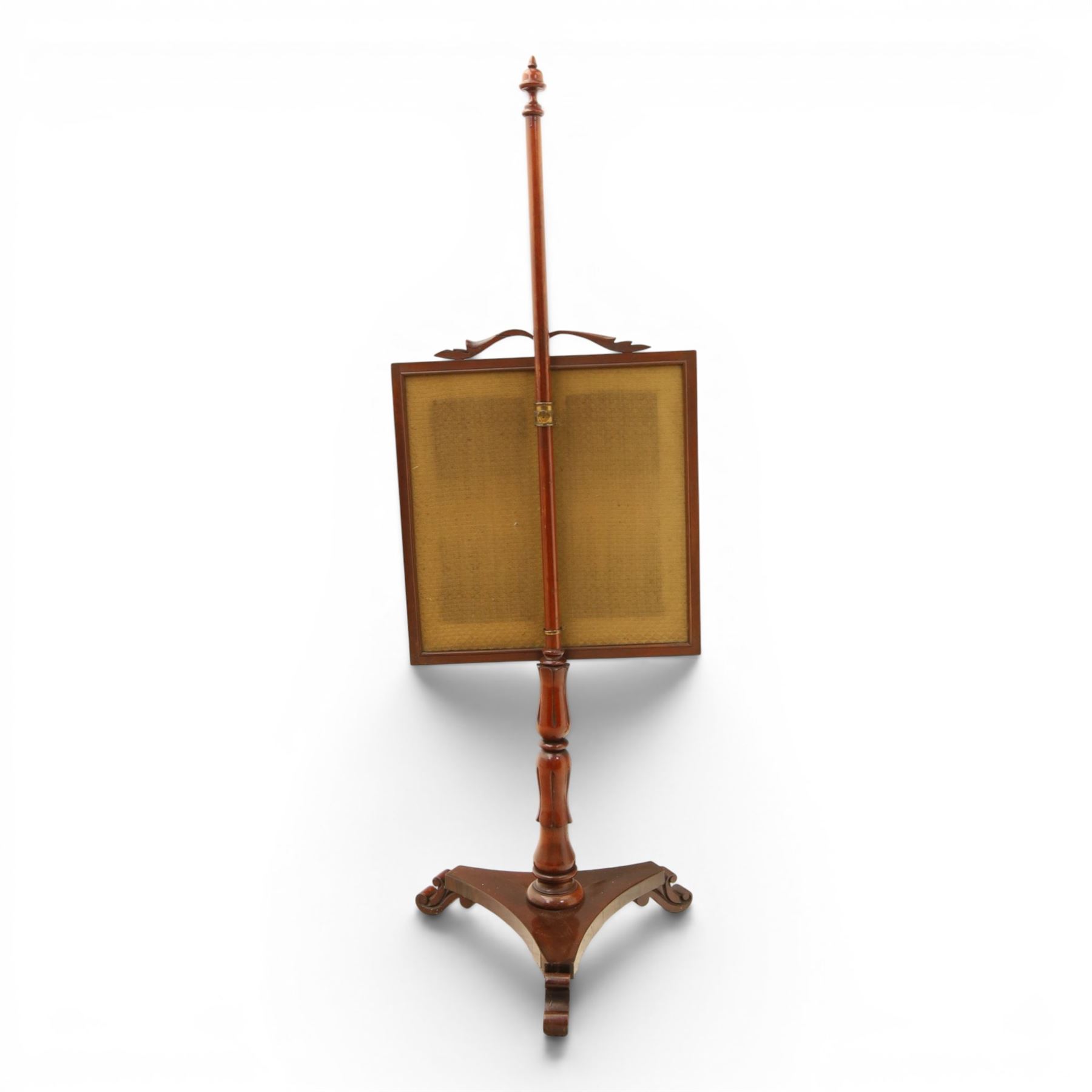 Two Victorian fire screens, comprising mahogany pole screen with glazed floral woolwork panel on turned support and triform base (H 142cm, W 48cm); and a larger carved walnut tapestry fire screen, glazed panel depicting a domestic interior scene, scroll carved cresting, barley twist uprights and turned stretcher base (H 75cm, W 49cm)