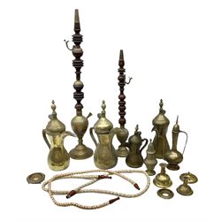Two brass hookah pipes, and quantity of brass Arabic Dallah coffee pots and other brassware