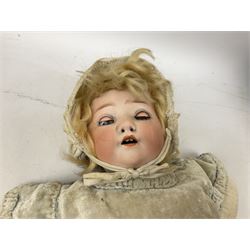 Heubach Koppelsdorf bisque head doll, with applied hair, sleeping eyes, open mouth with teeth showing, and bent limbed composition body marked verso Heubach Koppelsdorf 320.1, together with Armand Marseille composite doll marked verso AM Germany 351/4K and a mid 20th century teddy bear 