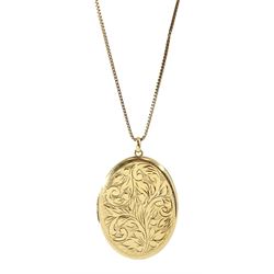 Gold oval locket pendant, on gold wheat link necklace, both hallmarked 9ct