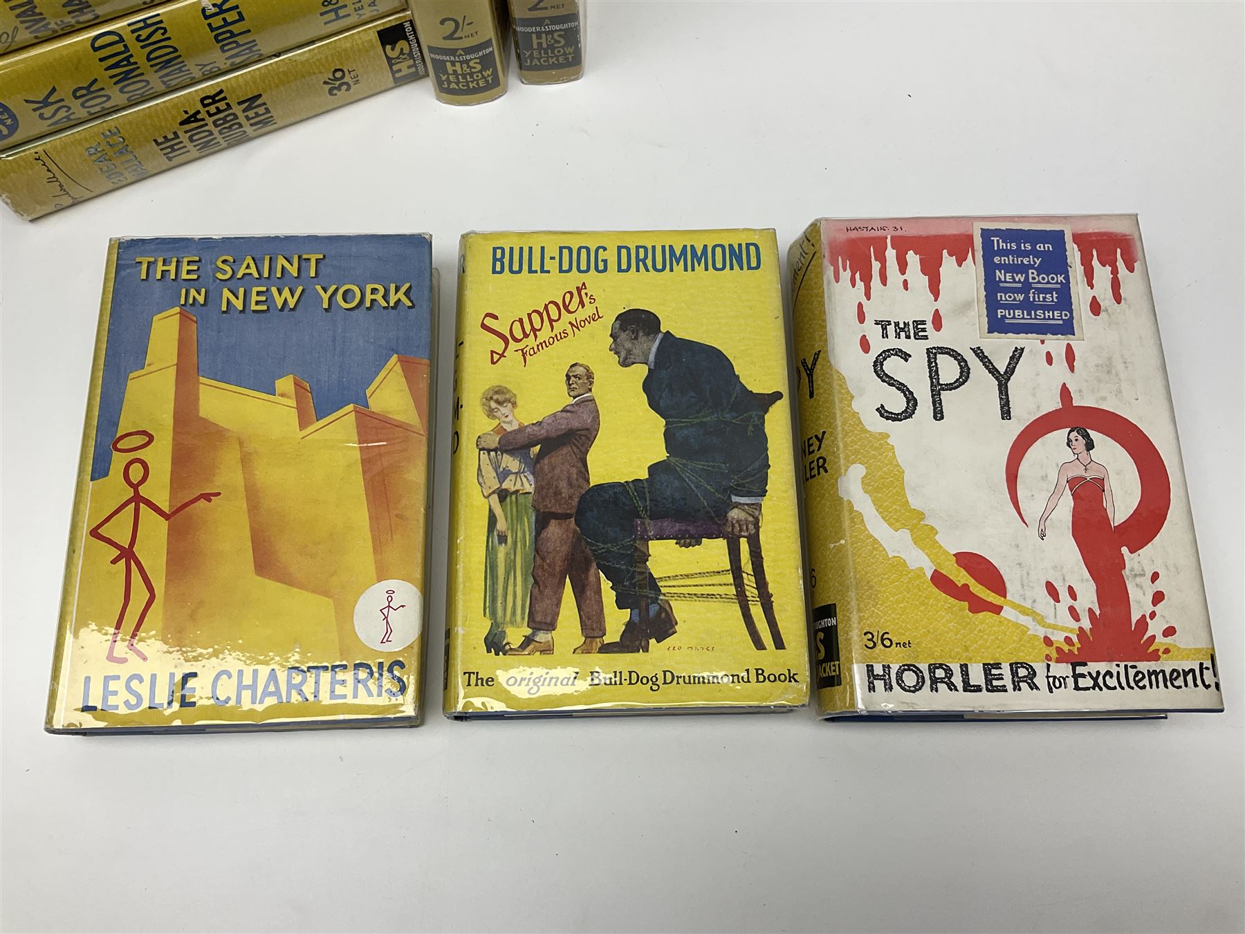 Collection of Hodder and Stoughton yellow jacket version books, to include Sydney Horler, George Goodchild, Dornford Yates, Leslie Charteris etc 