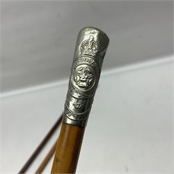 Three malacca cane swagger sticks - Duke of York's Royal military School L68cm; RAMC; and another embossed with a lion to the terminal (3)