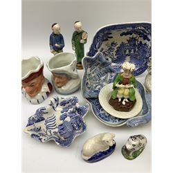 Two 19th century blue and white pickle dishes, each decorated in a variant of the Willow pattern, 19th century blue and white Willow pattern dessert dish, further Willow pattern dish, two black basalt jugs, small Victorian cockle dish, plus a group of Victorian and later figures, to include two Staffordshire arbour groups, one with beehive, Staffordshire style model of a sheep, two Sitzendorf monkey band figures, a Continental figure group modelled as a dancing couple, Atlas China figure of a Satyr, two jugs modelled as Punch and Judy, Rd no 139844, etc. 