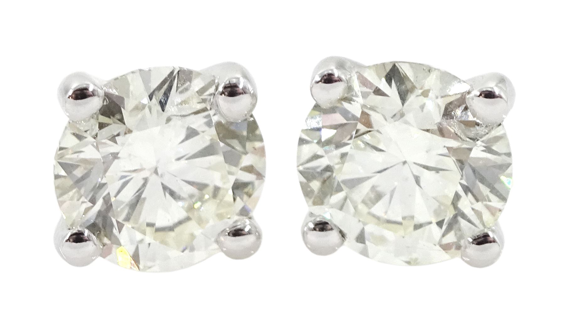 Pair of 18ct white gold brilliant cut diamond stud earrings, stamped 750, total diamond weight 2.00 carat