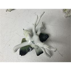 Seven Karl Ens bird figures, including barn owl, eagle owl, blue tit, budgerigar etc, all with mark beneath, tallest H17cm 