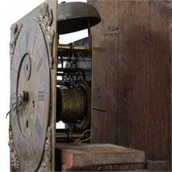 Thomas Holme of Hexham- mid 18th century 8-day oak longcase clock with a swan necked pediment and ball and spire finial to the centre, square hood door flanked by turned pilasters with brass capitals, trunk with canted corners and a long door with a gothic arched top, square plinth raised on an applied skirting, brass dial with 
