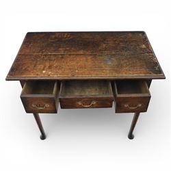 Georgian oak lowboy, the rectangular top with moulded edge over three fitted drawers and shaped apron, raised upon slender cabriole legs, with pad feet