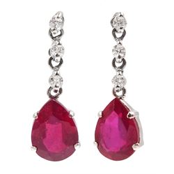 Pair of platinum ruby and diamond pendant earrings, stamped pt900