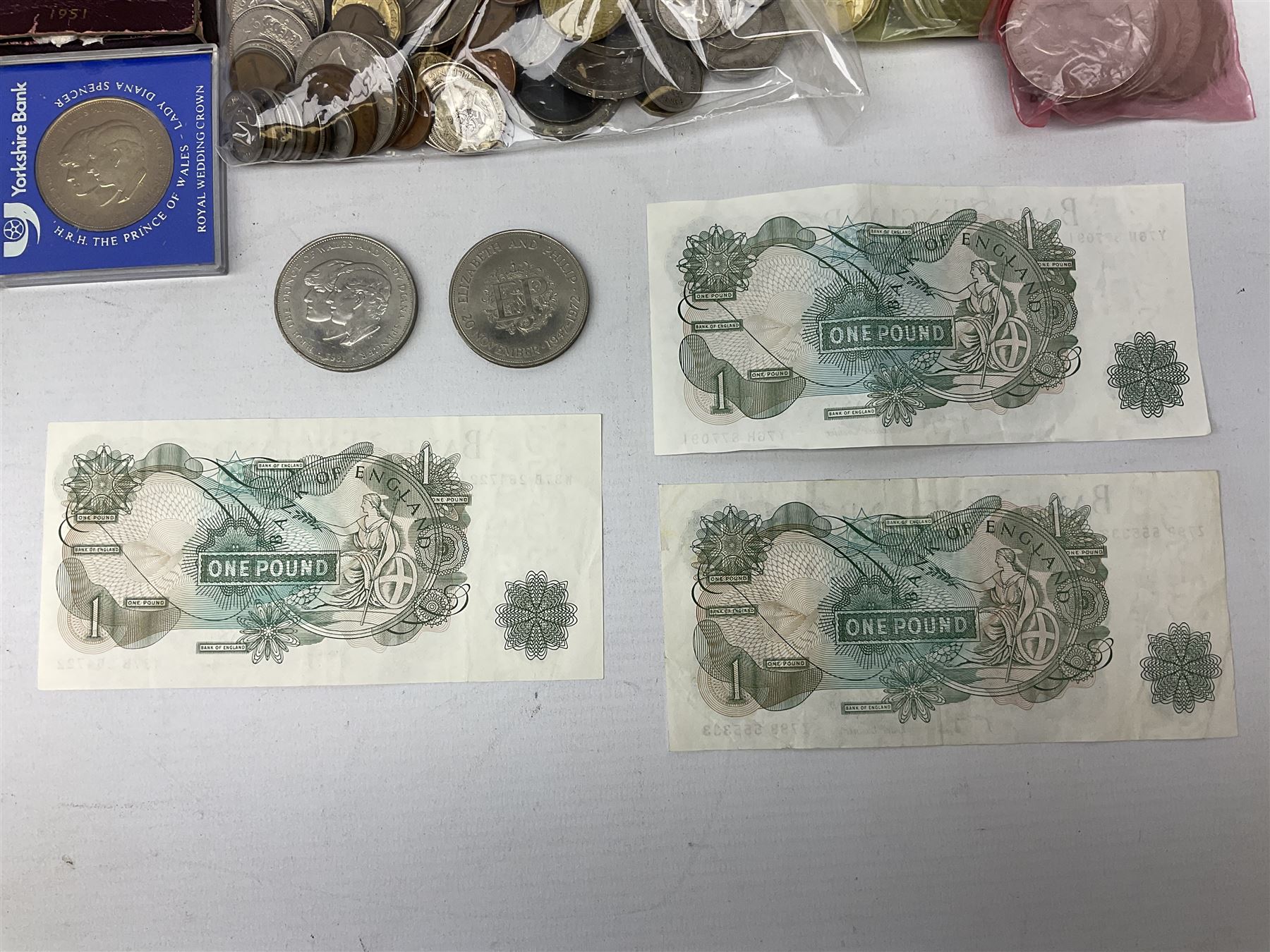 Great British and World coins including Queen Victoria 1887 and 1888 double florins, King George V 1929 halfcrown, King George VI 1951 Festival of Britain crown, commemorative crowns, Queen Elizabeth II 1953 nine coin set in blister pack, 1989 and 1995 two pound coins, various pre-decimal pennies and other coinage