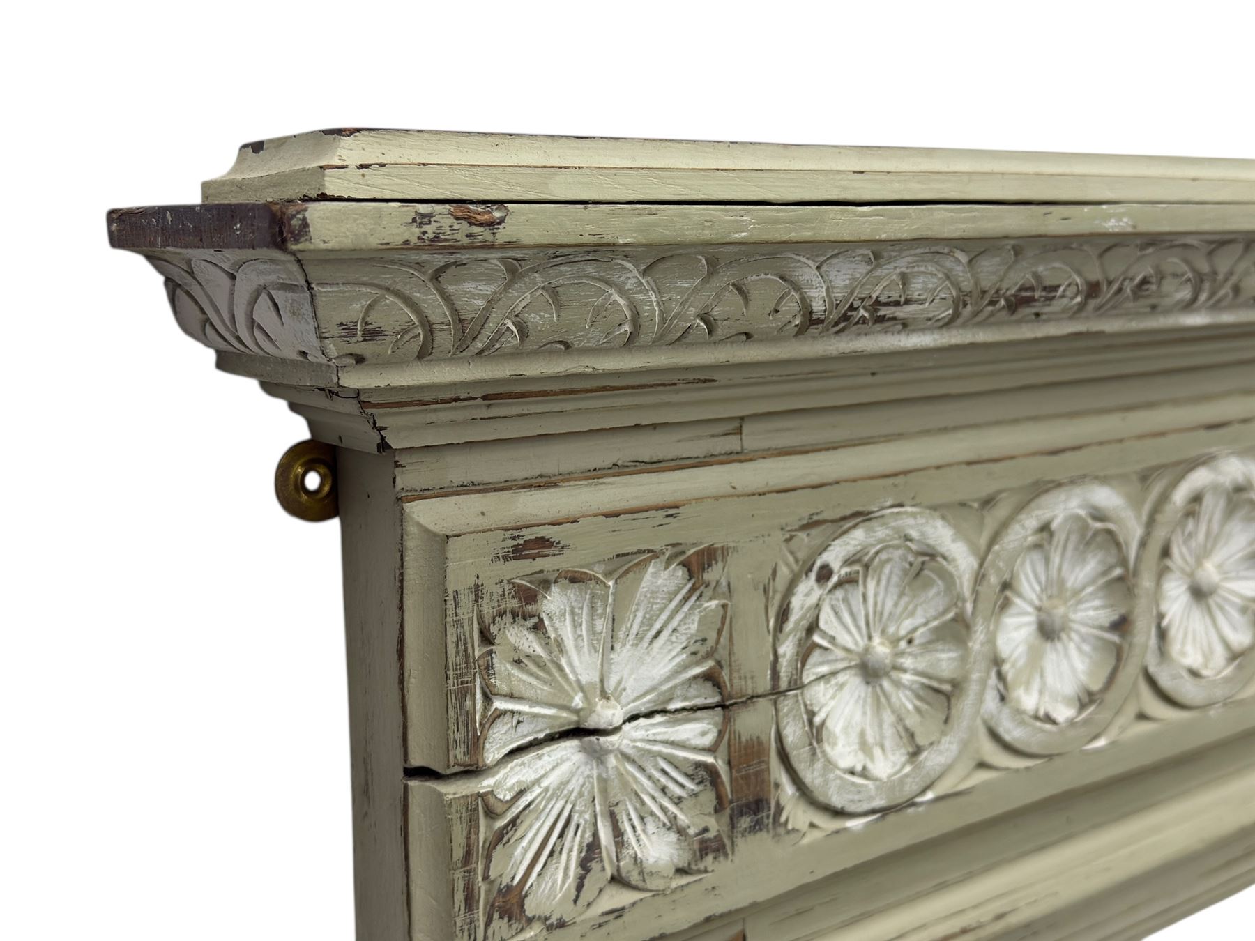 Victorian green and white painted mirror, rectangular bevelled plate within a moulded frame carved in relief with a continuous band of flowerhead roundels, the upper section with stepped cornice and leaf carved frieze  