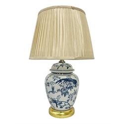 Table lamp of baluster form, decorated with exotic birds up fruiting trees, on gilt chrome pedestal, including shade H554cm