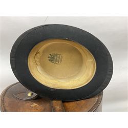 Early 20th century black silk top hat by Woodrow of Manchester and London, with manufacturer's stamp to the silk lined interior, housed in fitted tan leather hat box with removable internal compartments with straps, brass escutcheon and engraved plaque, hat internal measurements approx 20cm x 15cm