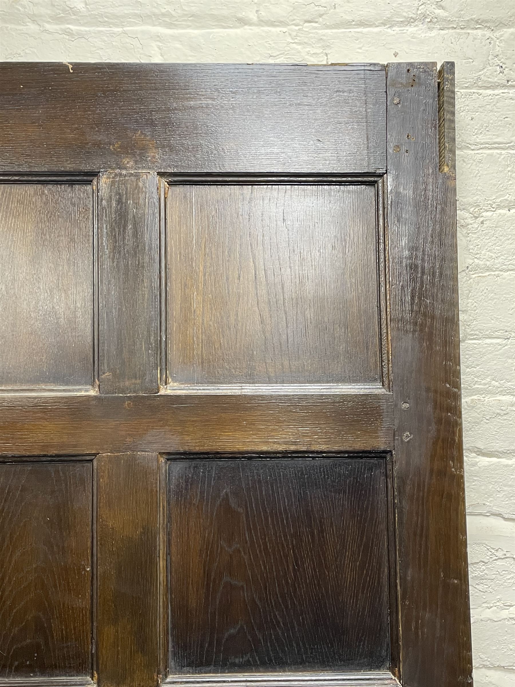17th century style oak 4' four poster bed, high panelled back with projecting canopy cornice and panelled roof, turned posts with panelled front