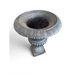 Pair of Victorian design heavy cast iron garden urns, black painted, egg and dart rim on waisted column