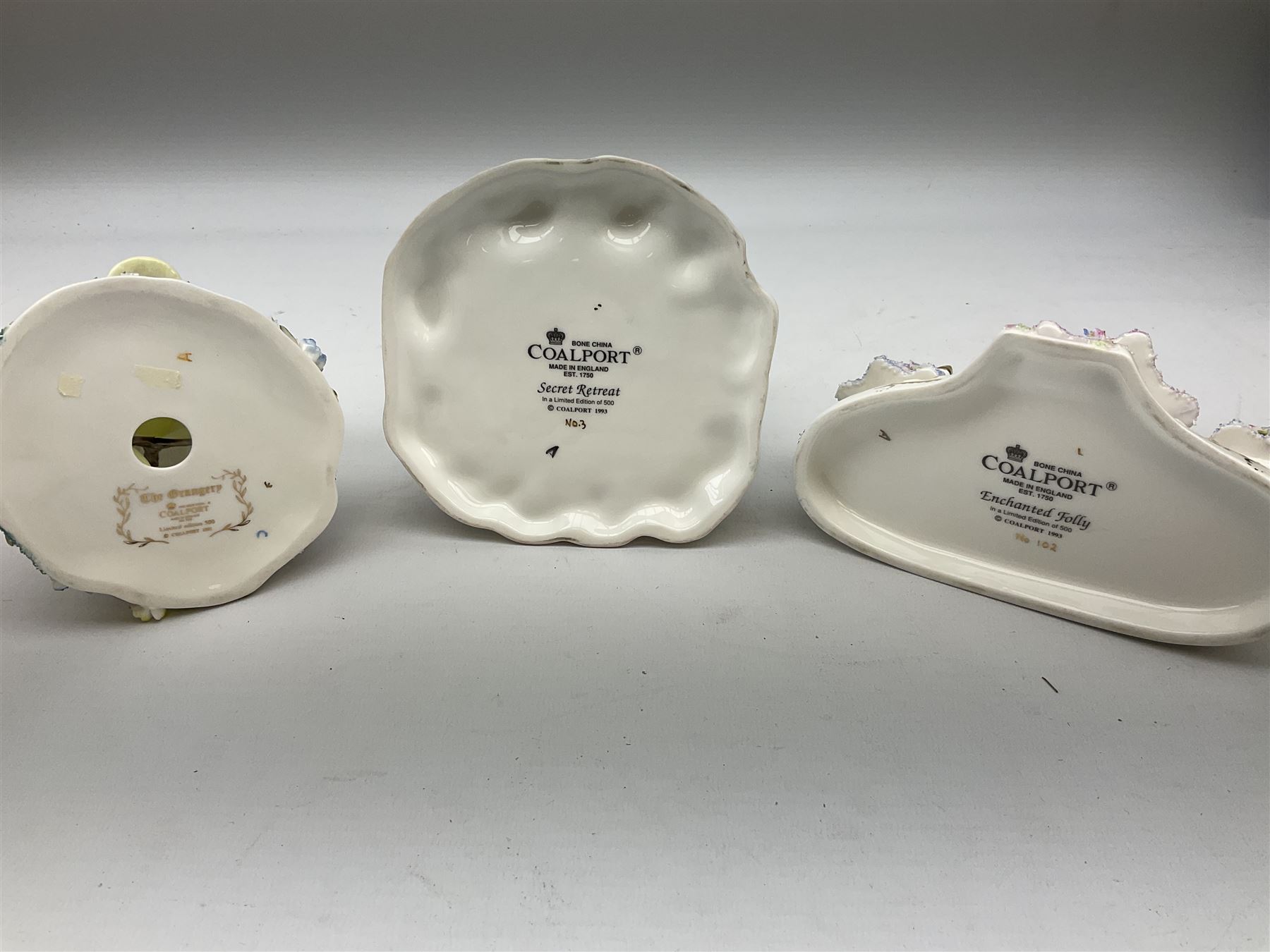 Twelve Coalport bone china pastille burner cottages, to include Fortune Towers, Summer Palace, The Vinery, Springtime Cottage, Dream Villa, Half Moon House, etc, all with original boxes and some with certificates 