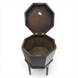 George III mahogany cellarette, of octagonal form with hinged top, brass handles and hinges, raised upon tapering supports