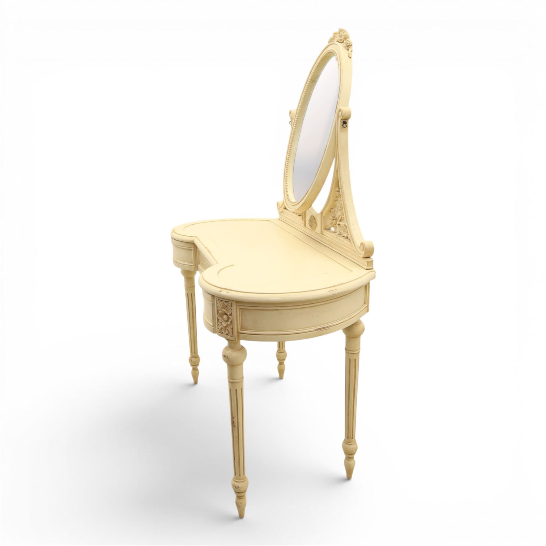 French Louis XV design cream painted dressing table and matching stool, kidney shaped top, with tilting oval mirror, carved uprights raised on fluted and turned supports 