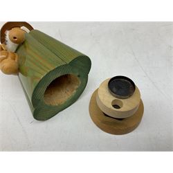 German Erzgebirgische Volkskunst folk art carved and stained wood smoking men incense burner figure, modelled smoking a pipe, with sticker label beneath, H19cm