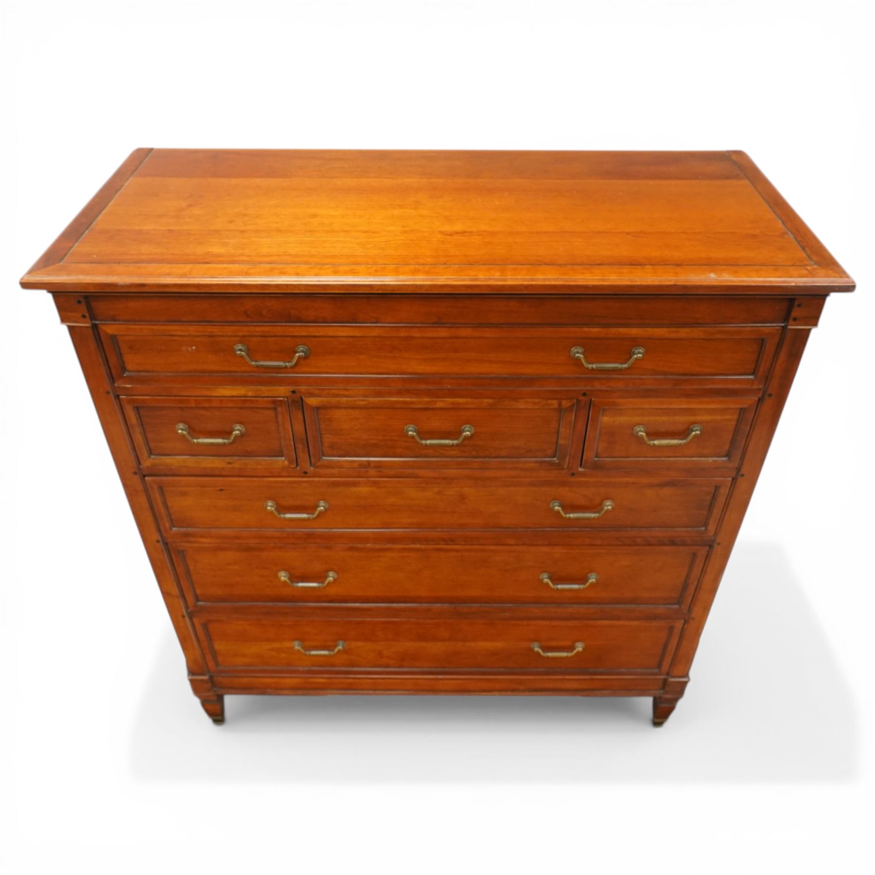 Willis & Gambier - 'Directoire' tall chest of drawers, rectangular top above an arrangement of seven drawers, raised on tapered and turned feet