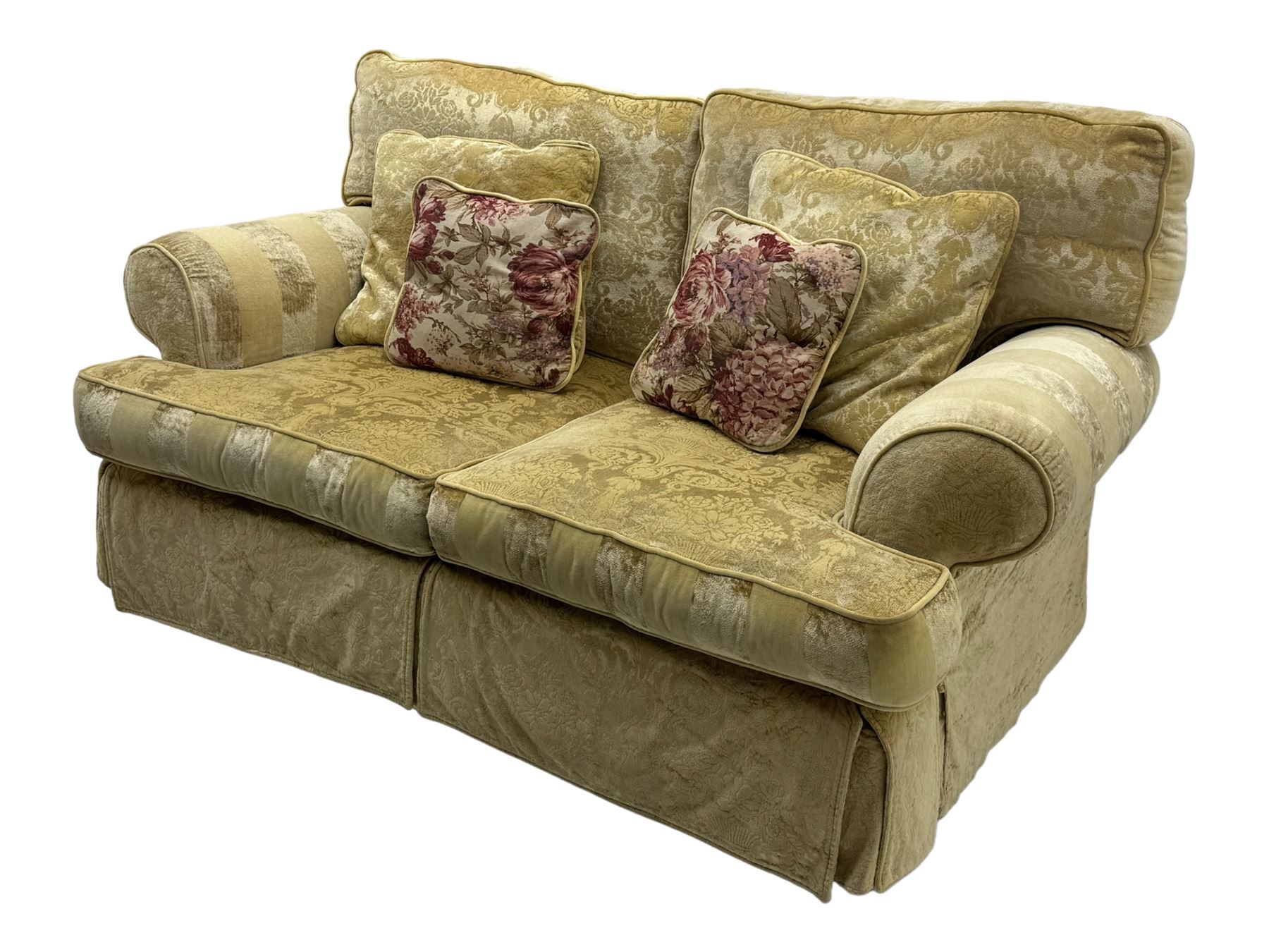 Contemporary two-seat sofa, upholstered in damask fabric with a pale gold floral pattern, rolled arms with covers, loose back and seat cushions, on matching skirted base with concealed castors