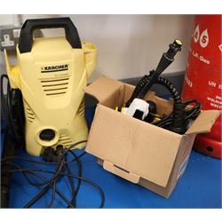 Karcher professional BR 30/4 C upright scrubber dryer floor cleaner; and a Karcher K2 compact pressure washer 