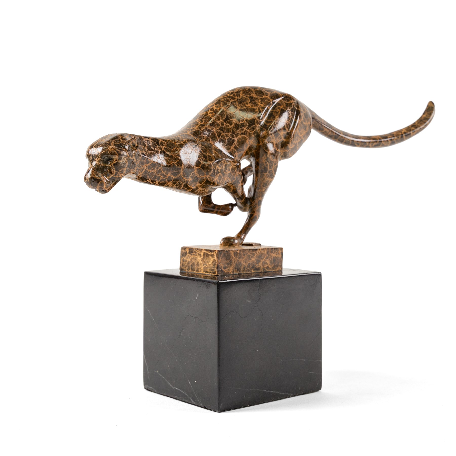 After Milo - Bronze two toned running cheetah, upon a rectangular marble base, with foundry mark, H20cm