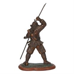 Japanese bronze of a Samurai, possibly Meiji period, standing holding spear, on a wave form base, H72cm